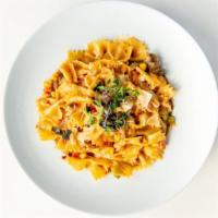 Spicy Farfalle Pasta · parmesan cheese, mushrooms, onions, bell peppers, corn, tomatoes

add grilled chicken for an...