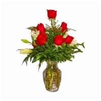 Lover'S Affection · Dozen. Red roses, lilies, and leather leaf fern.


Substitution Policy: Substitution of flow...
