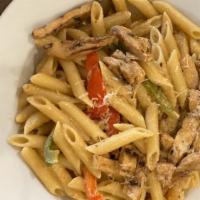 Cajun Chicken Pasta · Penne pasta with our house Cajun cream, topped with chicken breast. Served with French bread.