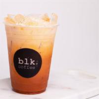 Iced Thai Tea · Black Thai tea leaves brewed for hours topped with breve milk. Enjoyed over ice.