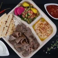 Beef Gyros Plate · Vertical broiled beef, hummus, basmati rice, shepherd salad,pickle turnip and chili peppers,...