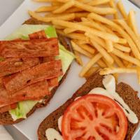 Blt With Garlic-Basil Aioli · Favorite. Toasted whole wheat bread, smokey soy baconless protein, tomato, lettuce, and garl...