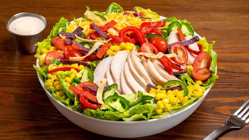 Fire-Roasted Southwest Chicken Salad · romaine, grape tomato, corn, roasted red pepper, jalapeno, tortilla strips, shredded jack cheese, chicken, sriracha ranch