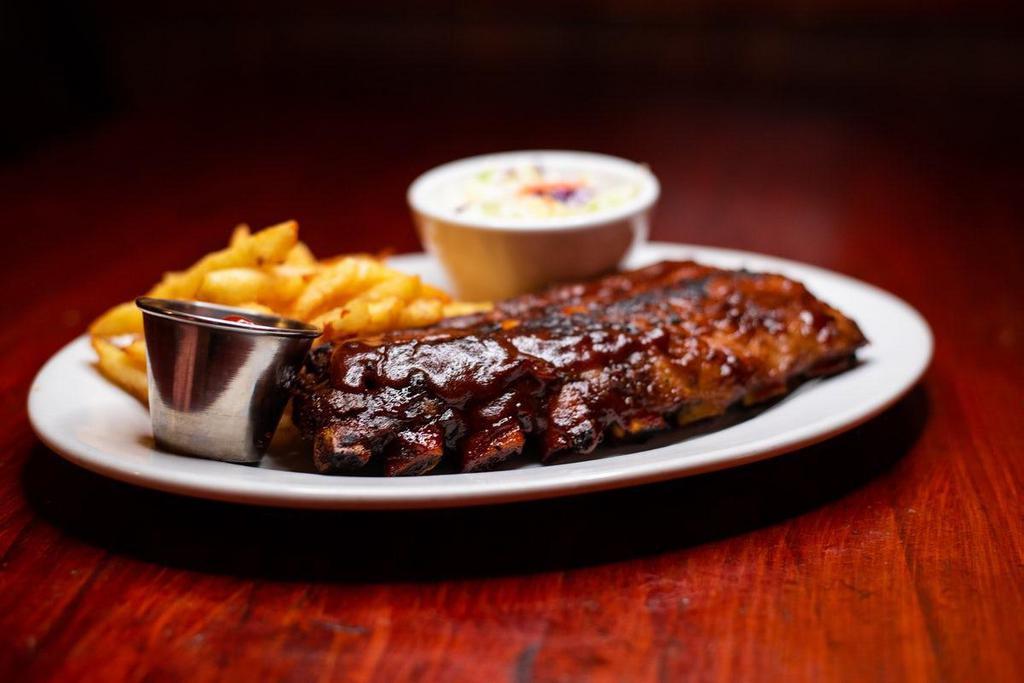 Sierra Mountain Ribs · Single rack of slow cooked ribs, wood-grilled and served. with our hand-cut Cabin Fries. Includes your choice of a. salad or scratch-made soup. Full (12-14 bones) Half (6-7 bones).