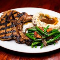 Pork Chops · Two center cut chops grilled over an almond wood fire. and paired with Mountain Mashers and ...