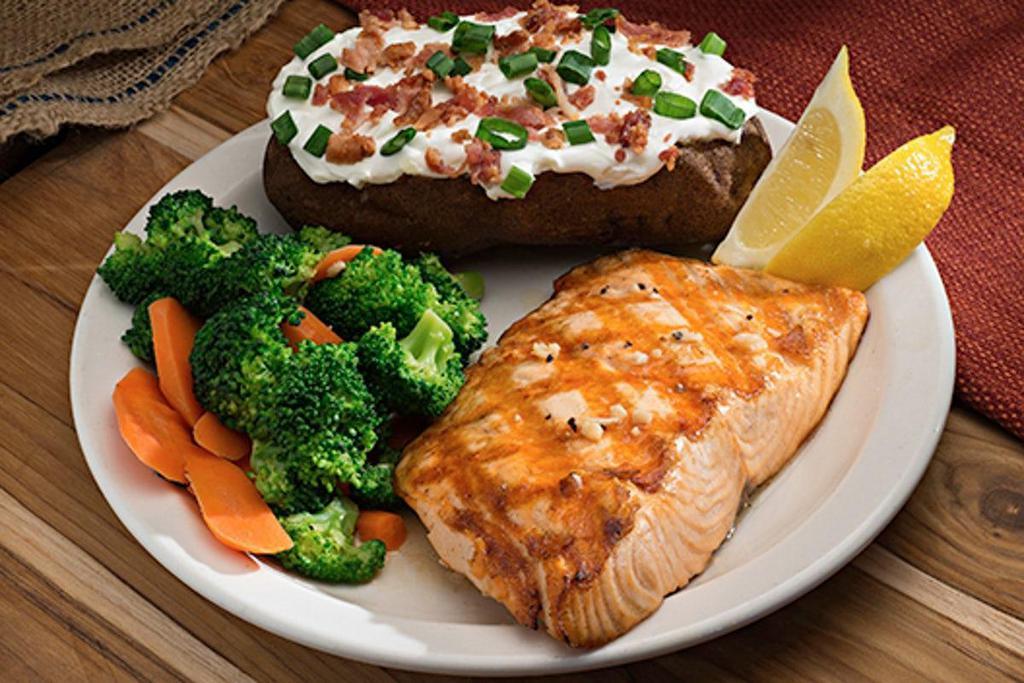Taylor Creek Salmon · Always fresh salmon served with a Big Baked Potato and fresh veggies.
