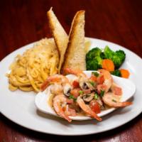 Shrimp Scampi · Six jumbo shrimp pan-seared with white wine, tomatoes, mushrooms, butter, lemon and a hint o...