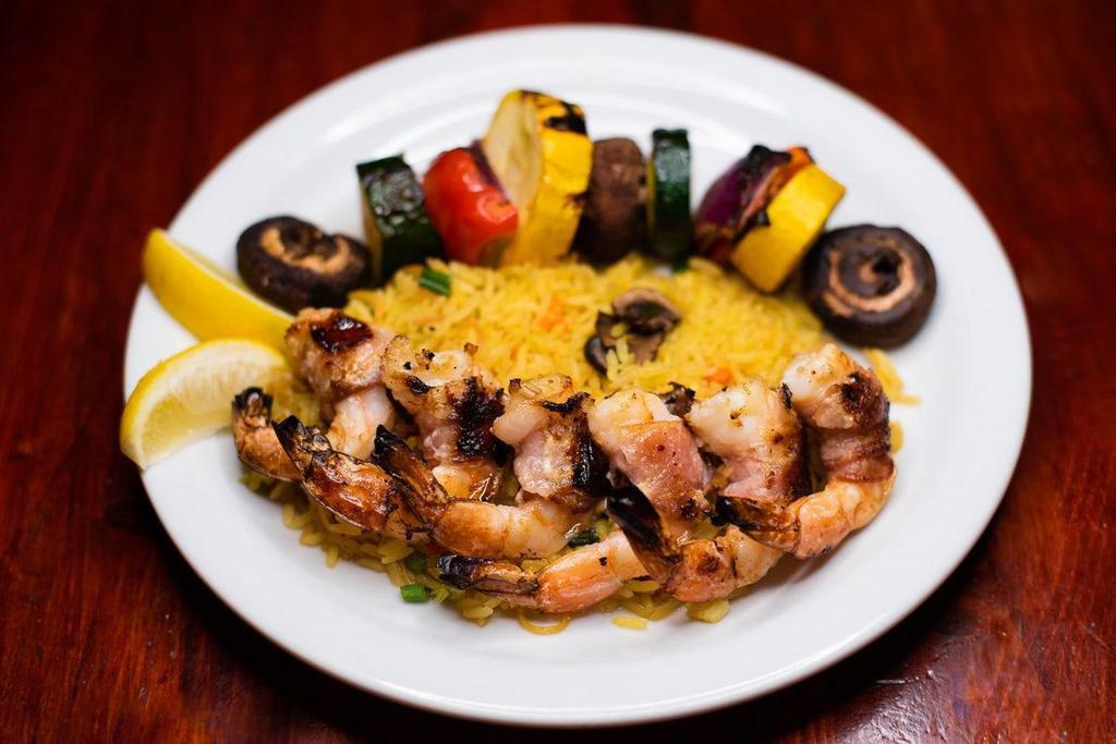 Bacon Wrapped Bourbon Shrimp · Jumbo shrimp wrapped in applewood-smoked bacon and basted with Knob Creek® Bourbon glaze.. Served with Vegetable Rice Pilaf and Wood-Grilled Veggies