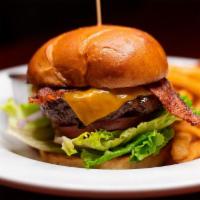 Black Jack Burger · A wood-grilled burger topped with crisp applewood smoked bacon and your choice of cheese. Se...