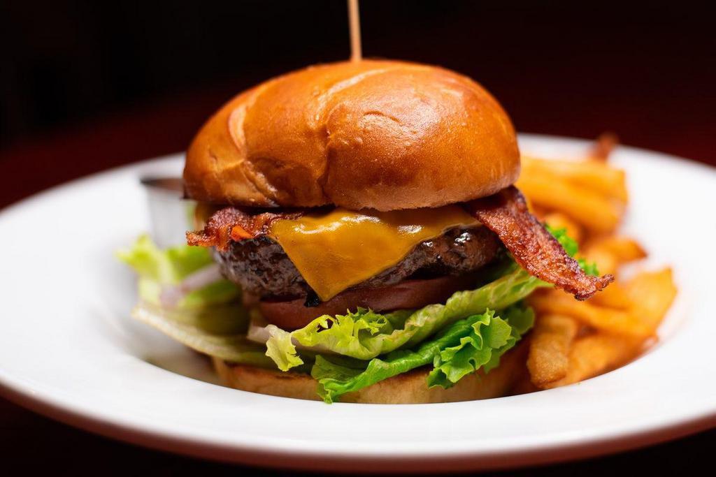 Black Jack Burger · A wood-grilled burger topped with crisp applewood smoked bacon and your choice of cheese. Served with hand-cut Cabin Fries.