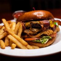 Smoke House Bbq Burger · Applewood-smoked bacon, cheddar cheese, hand-breaded onion strings and BBQ sauce.