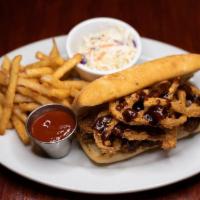 Bbq Pulled Pork Sandwich · Slow-roasted and hand-pulled pork tossed with Joe’s signature BBQ sauce & topped with crispy...