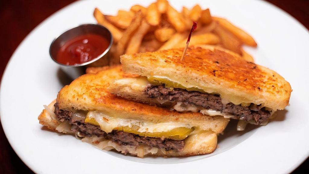 Sourdough Melt · A pan-seared burger topped with Monterey Jack cheese, sautéed onions and a green chile on Joe’s signature grilled Parmesan bread.