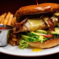 California Chicken Sandwich · A wood-grilled chicken breast topped with Monterey Jack cheese and crisp bacon along with sl...