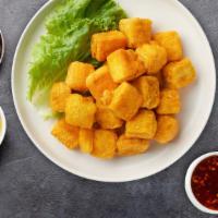 The Rise Of Fried Tofu · Lightly fried tofu served crisp with chili sauce