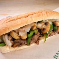 Philly Cheese Steak Sub · Thinly Sliced Steak, Fresh Mushrooms, Fresh Green Peppers, Onions, and Mozzarella Cheese
