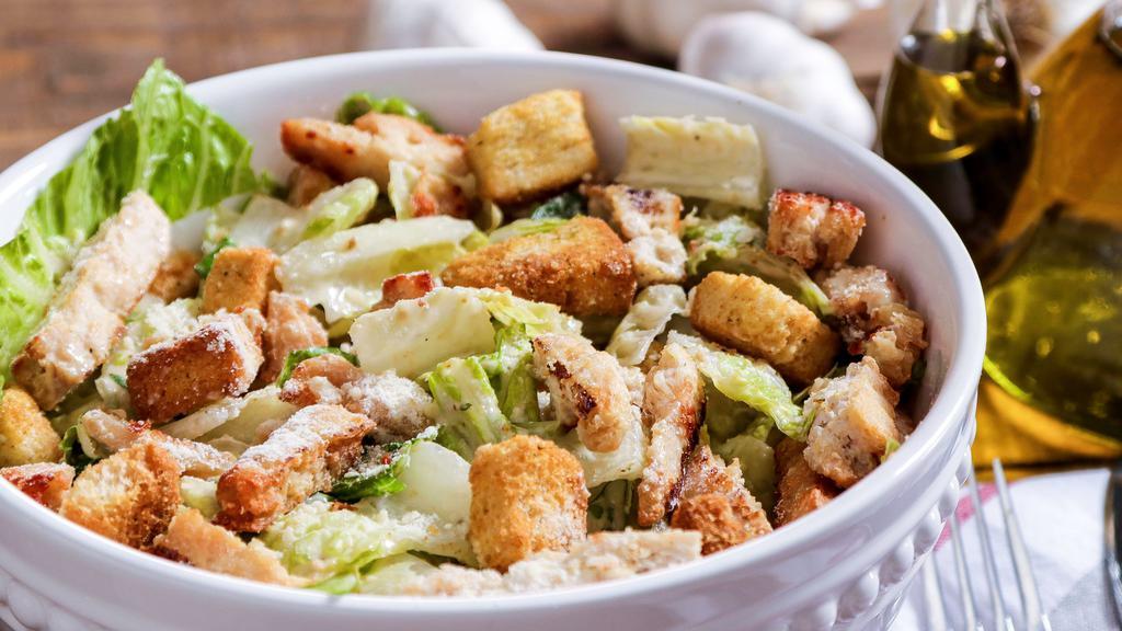 Caesar Salad · A classic Caesar made with romaine lettuce, seasoned croutons and Parmesan cheese.