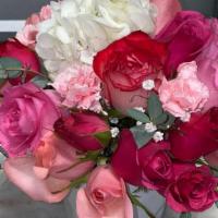 All Pink And More · A mix of pink florals  and hydrangeas in a solid vase. 

Each arrangement includes a  card w...