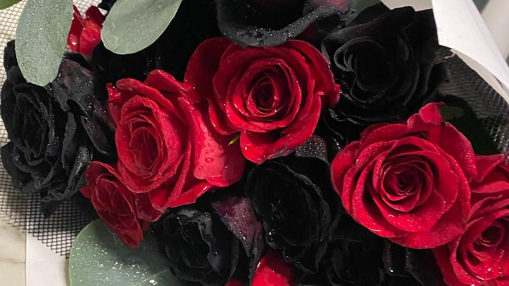 The Black & Red Bouquet · Mix of a 12 red (6) and black (6)  roses. 
Each arrangement includes a  card with a typed message.
**If you would like a message on the card please type it on 