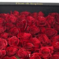 The Florence Box  · Red roses arranged in a beautiful black box. 

Each arrangement includes a  card with a type...