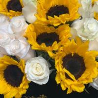 Beautiful Sunflowers · A mix of sunflowers and white roses in a luxurious black box.

Each arrangement includes a  ...