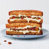 The Special · Chorizo, queso fresco, pepper jack cheese, roasted jalapenos and red peppers mix & Society S...