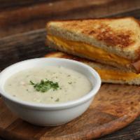New England Combo · Classic roosevelt and a bowl of New England clam chowder soup.