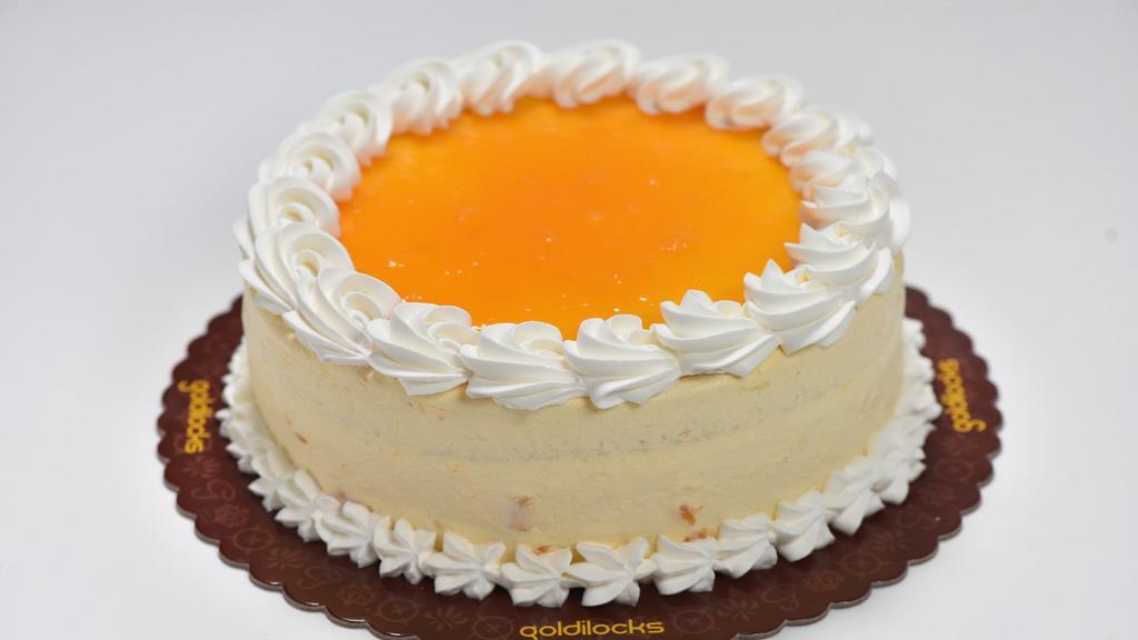 Mangolicious Cake · Vanilla chiffon cake filled and topped with whipped cream and sweet pureed mangoes.  Serves 8-12.