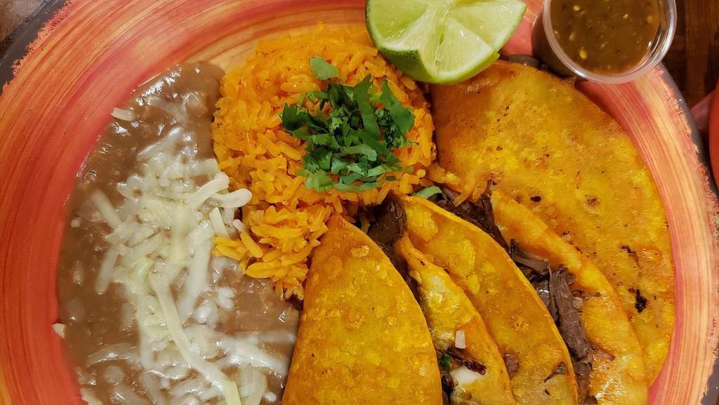 Quesataco Plate · Most popular. Protein: Our authentic flavorful Mexican stew with beef served with fried tortillas. Toppings: Freshly cut cilantro, onions and Monterey Jack cheese. Sides: Accompanied with our authentic rice and beans.