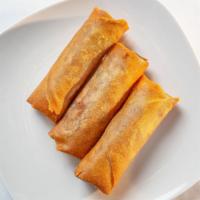 Lumpia · Fried egg roll with ground pork, peas, carrots, onions, and corn.