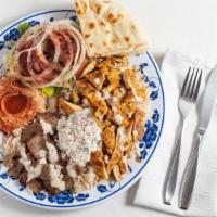 Combo Platter · Chicken, Gyro, Salad, Rice, Hummus, Tzatziki Sauce, Tahini Sauce and Pita Bread.