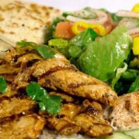 Chicken Platter · Chicken, Salad, Rice, Hummus, Tzatziki Sauce, Tahini Sauce and Pita Bread.