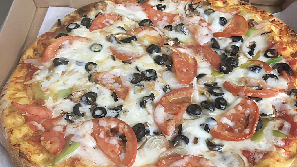 Vegetarian Pizza · Extra cheese, mushrooms, black olives, bell peppers, onion, fresh tomato and Mozzarella cheese.