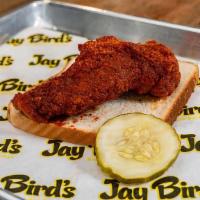 Solo Tender · One chicken tender spiced with your choice of heat, served with sliced bread and dill pickle.
