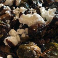 Brussels Sprouts · Deep fried brussels sprouts, goat cheese, balsamic glaze.