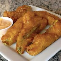 Pickle Spears · Dill pickles deep fried with IPA beer batter.
