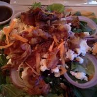 Bacon & Goat Cheese Salad · Crispy bacon, goat cheese, pecans, red onion, sliced tomato, spring mix salad.