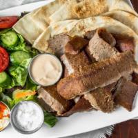 Gyro Plate · Gyro`meat and fresh mixed green salad, served with tzatziki sauce, hummus and pita bread