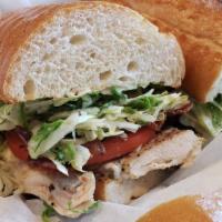 San Diegan · Turkey breast topped with bacon and avocado, served on squaw bread. Includes mayo, tomato, a...