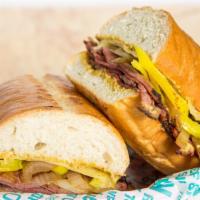 Left Coast Pastrami · Hot pastrami with grilled onions, dijon mustard, pepperoncini peppers and melted swiss chees...