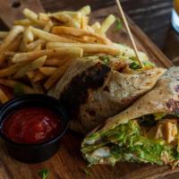 Mango Habanero Wrap · Grilled chicken tossed in a house Mango Habanero sauce with chopped romaine, crispy bacon, a...
