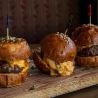 Sliders · Three sliders with caramelized onions and 1000 island dressing with  your choice of protein ...