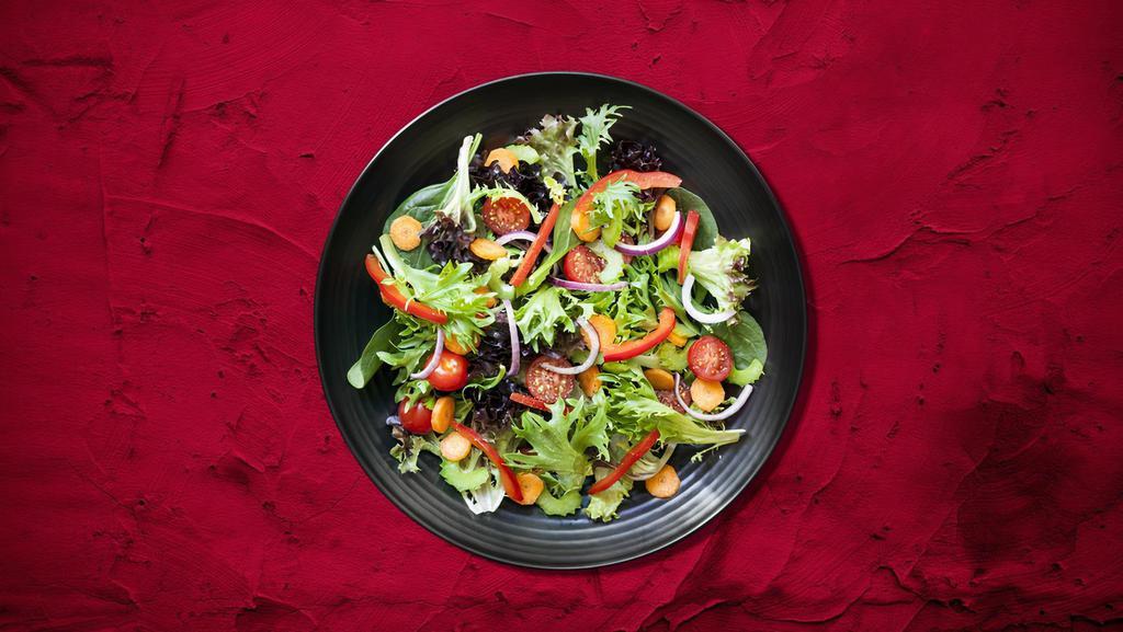 Green Garden Salad · Tossed green salad made with lettuce, carrots, tomatoes, cucumbers and onions.