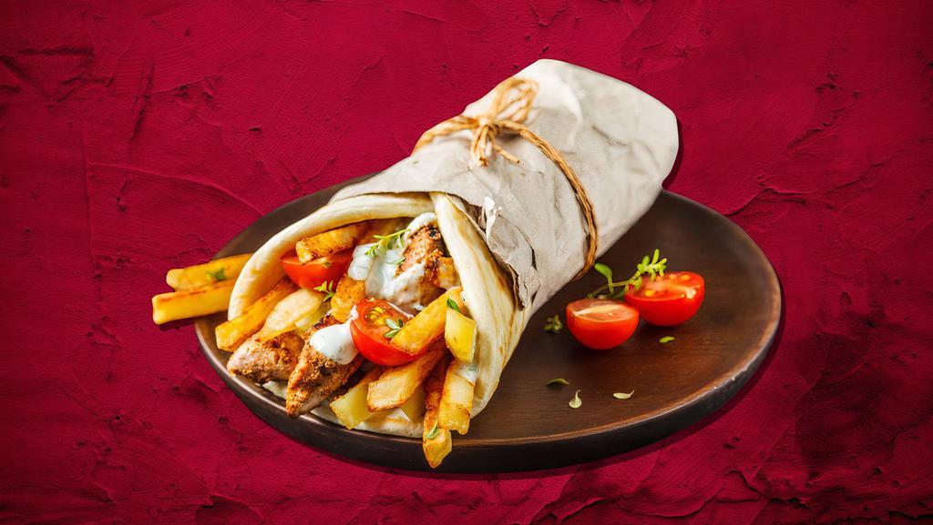 Chicken Cheese Steak · Chicken cheesesteak made to perfection in footlong bread with fresh veggies. Comes with white sauce and ketchup.