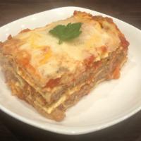 Lasagna · Layers of Pasta, Swiss Cheese, Parmesan Cheese with Meat Sauce.