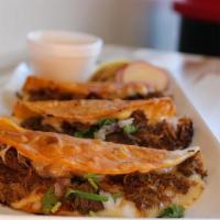 3 Quesatacos Con Consome · 3 LARGE BIRRIA QUESATACOS YELLOW CORN TORTILLA WITH BIRRIA MEAT TOPPED WITH CILANTRO AND ONI...