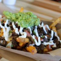 Loaded Fries · SEASONED FRIES, TOPPED CHEDDAR CHEESE SAUCE, SHREDDED OAXACA AND JACK CHEESE,  YOUR CHOICE O...