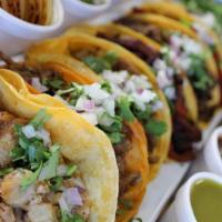 Asadero Tacos · CORN TORTILLAS WITH CHOICE OF MEAT TOPPED WITH CILANTRO AND ONION.