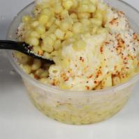 Esquite · CORN KERNELS, MAYO, CHILLI POWDER,  TOPPED WITH COTIJA CHEESE AND BUTTER