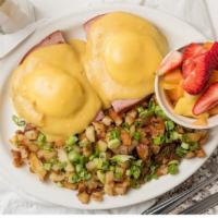 Eggs Benedict · With your choice of ham, sliced avocado or country sausage on a grilled English muffin, topp...